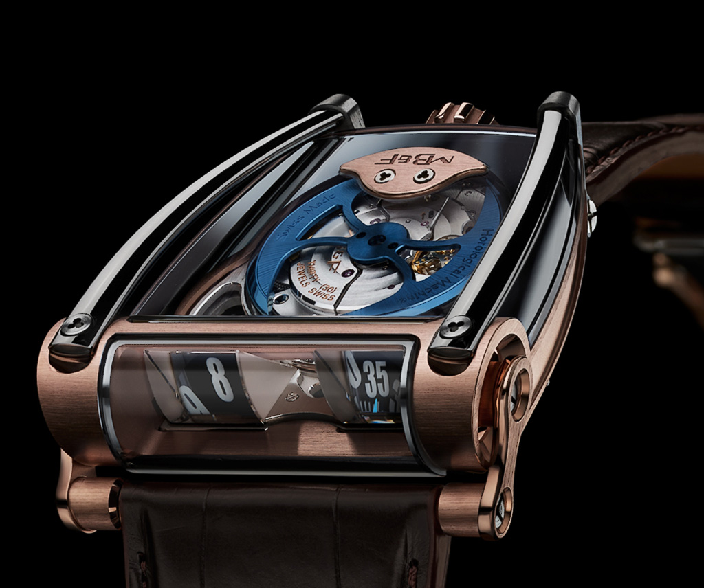 MB&F HM8 in rose gold. The signature battle axe rotor in stunningly beautiful blue is showcased below the sapphire glass covering the entire top of the case.